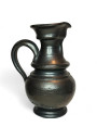 Old black pitcher signed Jean Marais from the 50s