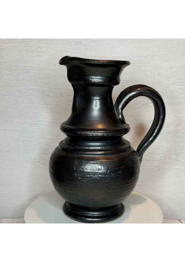 Old black pitcher signed Jean Marais from the 50s