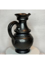 Old black pitcher signed Jean Marais from the 50s