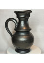 Old black pitcher signed Jean Marais from the 50s