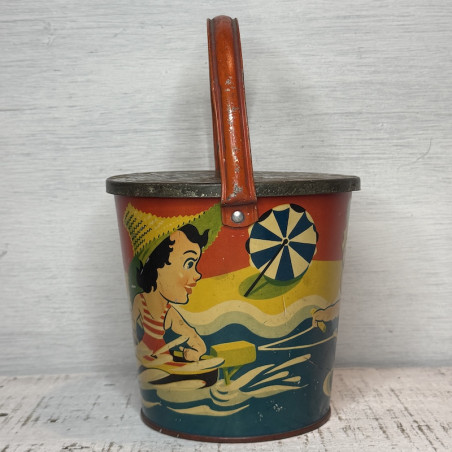 Old metal children's toy beach bucket