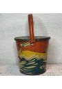 Old metal children's toy beach bucket