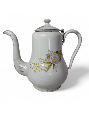 Old white enameled sheet metal coffee pot with floral decoration