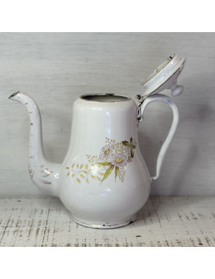 Old white enameled sheet metal coffee pot with floral decoration