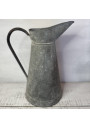 Old large galvanized metal jug