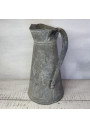 Old large galvanized metal jug
