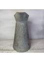Old large galvanized metal jug