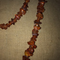 Grand collier sautoir vintage en chips d’ambre