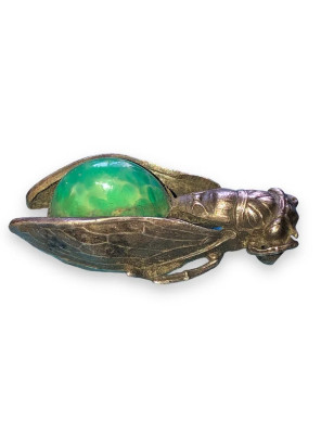 Antique cicada brooch with green stone cabochon