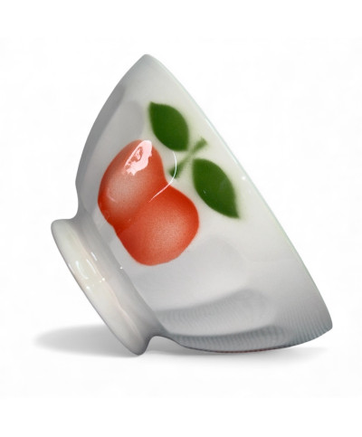 Ancien bol à facettes décor de pêche ou pomme sur fond blanc