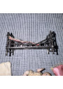 Collectible Miniature: Biscuit Porcelain Baby and Antique Wrought Iron Bed