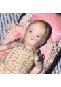 Collectible Miniature: Biscuit Porcelain Baby and Antique Wrought Iron Bed