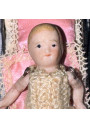 Collectible Miniature: Biscuit Porcelain Baby and Antique Wrought Iron Bed