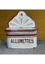 Antique white and red enameled tin matchbox
