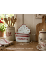 Antique white and red enameled tin matchbox
Contextualization of the article created with AI