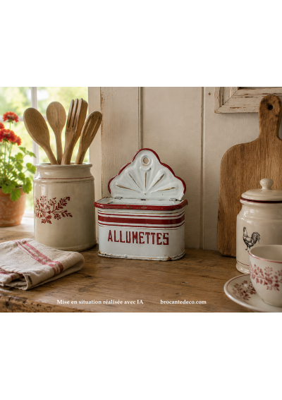 Antique white and red enameled tin matchbox
Contextualization of the article created with AI