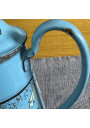 Antique blue enameled tin coffee pot with raised floral decoration 🌸