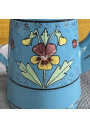 Antique blue enameled tin coffee pot with raised floral decoration 🌸