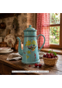 Old enameled metal coffee pot with bird and cherry decor
Contextualization of the article created with AI