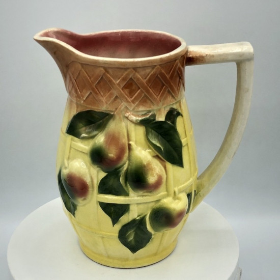 Old slip-in pitcher decorated with pears