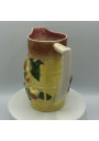 Old slip-in pitcher decorated with pears