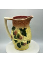 Old slip-in pitcher decorated with pears