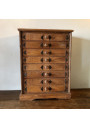 Old small wooden storage unit with 8 drawers