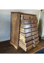 Old small wooden storage unit with 8 drawers